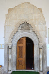 Fototapeta na wymiar special inlaid wooden door of the historical mosque