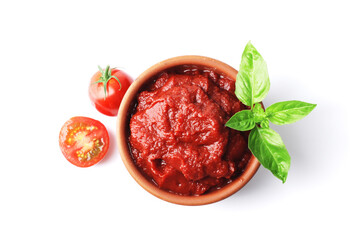 Ripe fresh tomatoes on a white plate, tomato sauce. Cooking ingredient. Fragrant spice green basil. For design. bowl with tomato sauce basil and fresh tomatoes isolated on white background.
