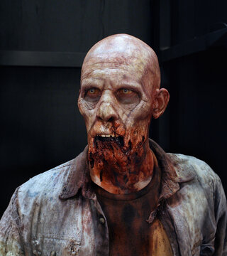 Male zombie with missing jaw 