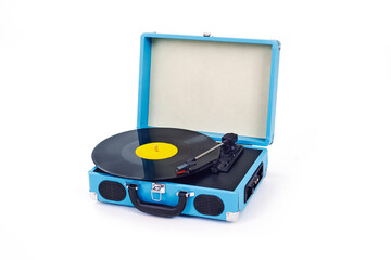 portable turntable playing a disc