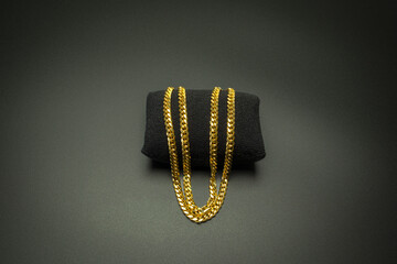 Chunky chain golden metallic necklace or bracelet. Personal fashion accessory design or costume...
