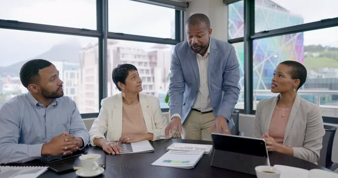 Black man, leadership or business people talking in meeting planning our vision or team strategy in office. CEO, documents or African manager in a discussion for sales project or financial growth