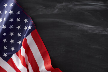 Embracing the back-to-school spirit in America. Top view composition of national american flag on school blackboard background with empty space for promo or text - Powered by Adobe
