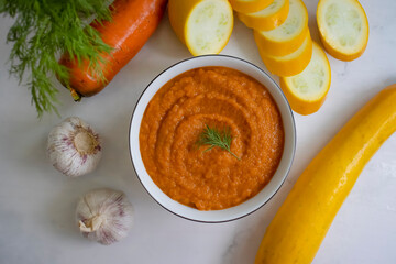 Zucchini caviar on an old background