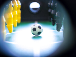 Table football game close up player and soccer