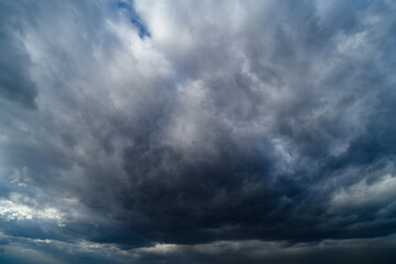 storm sky, dark dramatic clouds during thunderstorm, rain and wind, extreme weather, abstract background