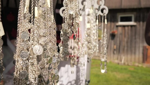 Man buying typical baltic jewelleries on little market (Estonia)