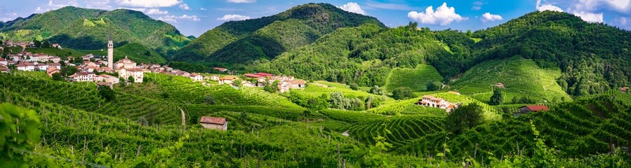famous wine region in Treviso, Italy.  Valdobbiadene  hills and vineyards on the famous prosecco wine route and scenic villages - 630482638