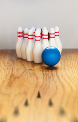 Bowling set on wooden floor