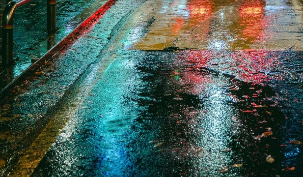 Close-up of concrete road at night