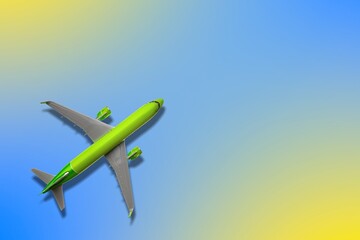 Airplane colored toy flying on color background