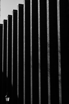 Grayscale photo of brutalist facade of building