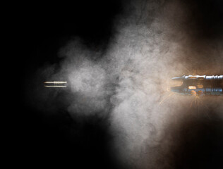Bullet leaving the barrel of a gun