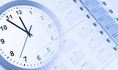 Time management. Clock face and calendar page