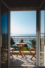  Terrace with a table overlooking Mediterranean sea - 630493285