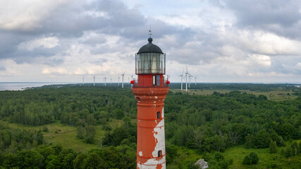 Lighthouse and wind turbines in the Baltic sea coast