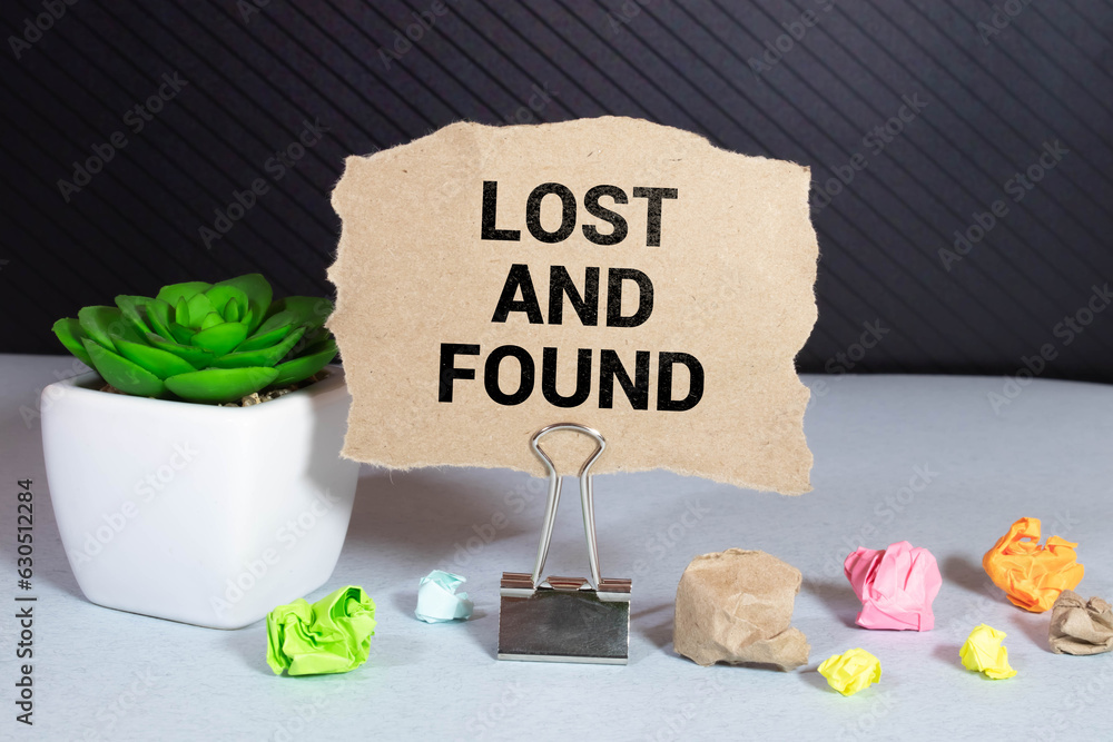 Poster lost and found text on notepad, concept background