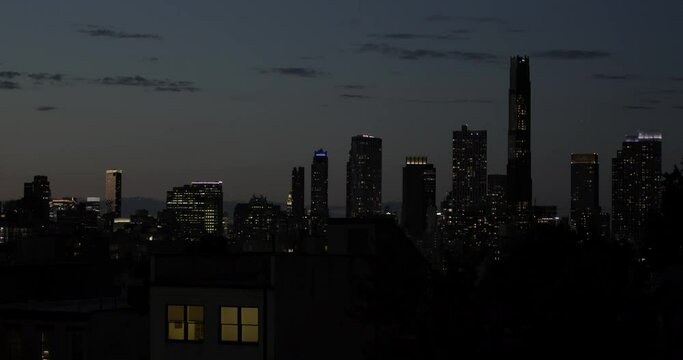New York skyline from Brooklyn rooftop at sunset