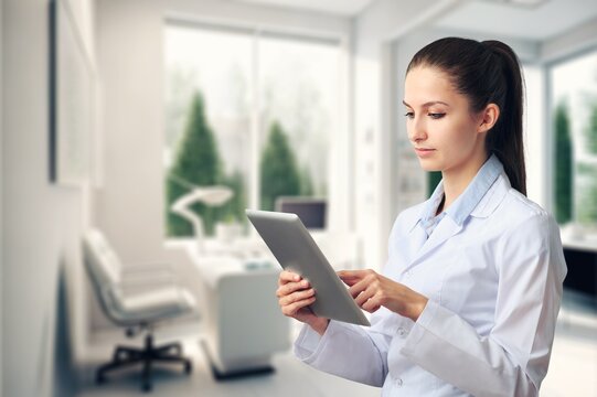 young female doctor hold the digital tablet in hospital, AI generated image
