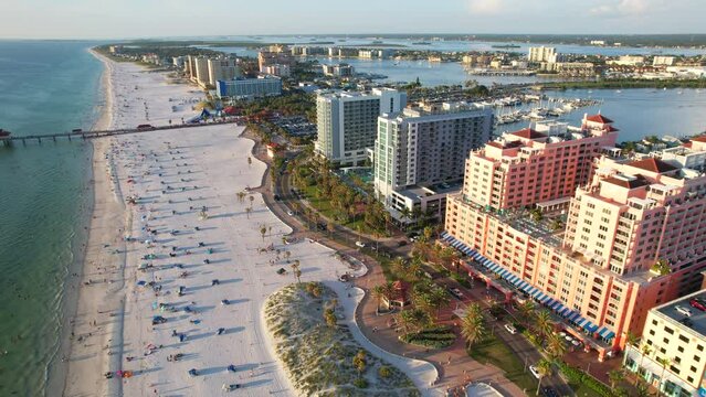 Florida. Panorama of Clearwater Beach FL. Summer vacations in Florida. Beautiful View on Hotels and Resorts on Island. Sunset time. Ocean water. American Coast. Shore Gulf of Mexico. Aerial view