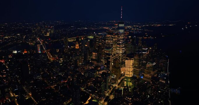 Billions of lights in the immense panorama of metropolis. Splendid cityscape of New York at night. Top view.