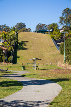 A grassy easement for an underground water pipeline in a residential area on the Gold Coast in Australia