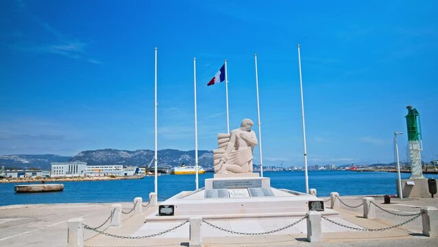 Port de La Seyne-sur-Mer in Toulon, France. Super marina with fishing boats, pleasure boats, and Corsica ferries surrounded by blue water in the south of France.