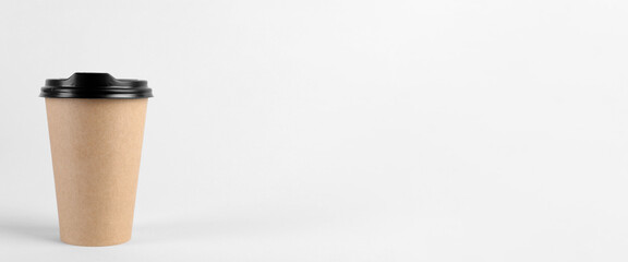 To-go drink. Paper coffee cup on white background, space for text. Banner design