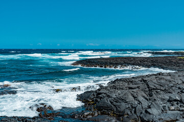 Fototapeta na wymiar Punalu'u Black Sand Beach , Big Island, Hawaii. Pahoehoe Lava. volcanic rock.