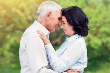 Fototapeta premium Happy senior couple having fun at park