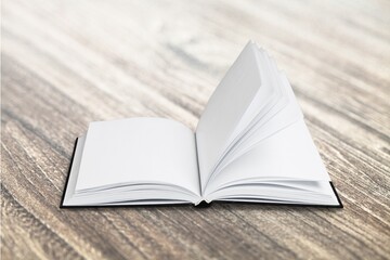 Open book on desk background, reading concept