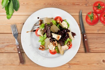 Fresh tasty vegetable salad in plate