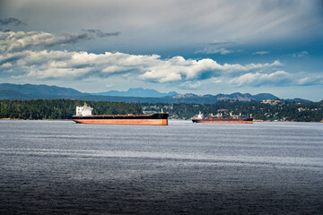 Empty freighters and container ships anchored off the coast of Vancouver Island awaiting to be loaded during the BC Port Workers Strike at Nanaimo BC..