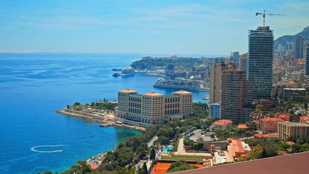 Panoramic view of Luxury Modern Bay Hotels and Resorts in the center of Monaco. Aerial view of the entire Monaco Country with skyscrapers and a wealthy lifestyle.