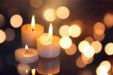 Beautiful aroma candle with fire on the desk