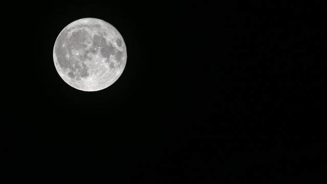 full moon in the night sky. Sturgeon Moon