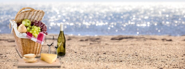 Classic picnic basket with a wine bottle