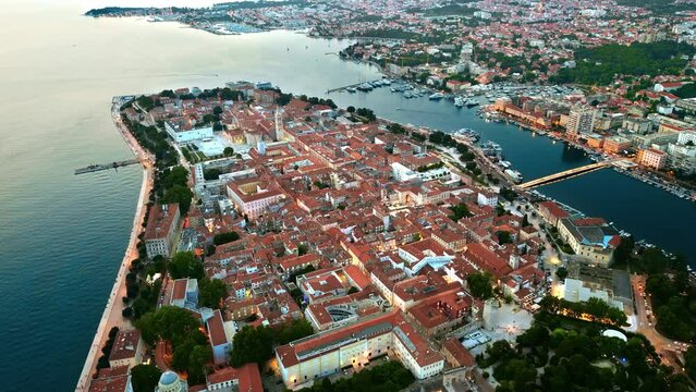Aerial drone view of Zadar in evening, Croatia. Historical city centre with old buildings and water channels