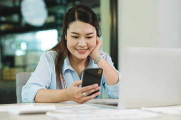 Businesswoman Engaging with Mobile Phone Technology. Digital Entrepreneurship.