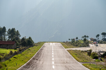 View of short airport runway of Tenzing–Hillary airport (known as Lukla Airport) in Lukla, Nepal.