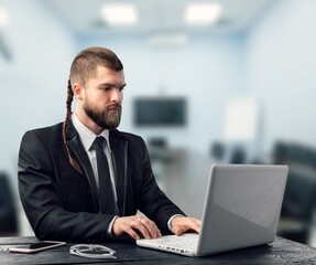 Creative young business man use laptop computer