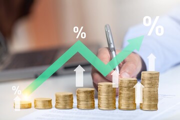 Interest rate concept, Businessman calculate dividend tax