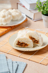 Baozi or Chinese Steamed Buns is a type of yeast-leavened filled bun in various Chinese cuisines.