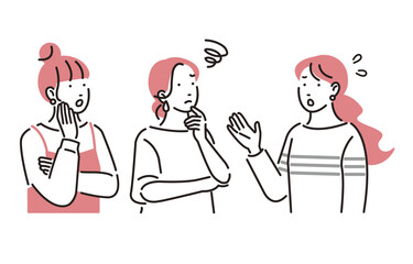 困った顔で会話をする女性たち
