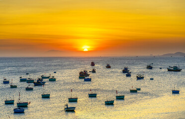Mui Ne fishing village in sunset sky with hundreds of boats anchored to avoid storms, this is a beautiful bay in central Vietnam