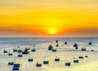 Mui Ne fishing village in sunset sky with hundreds of boats anchored to avoid storms, this is a beautiful bay in central Vietnam