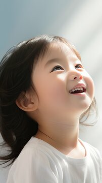 Close up portrait of chinese child girl looking up the sky with hope