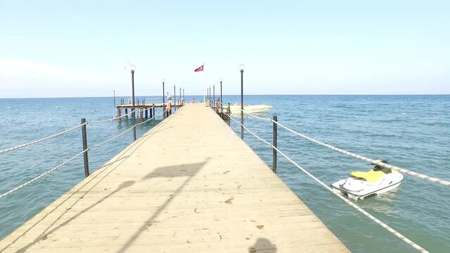a boat dock on the beach of beldibi in kemer