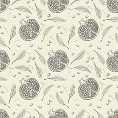Seamless pattern. Pomegranate fruits and leaves. Monochrome retro graphics.