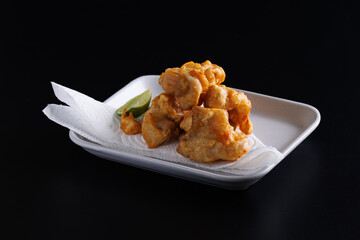 Chicken Karaage Japanese Fried chicken isolated in black background
